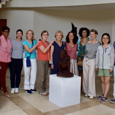 Bajan Interpreters With Statues